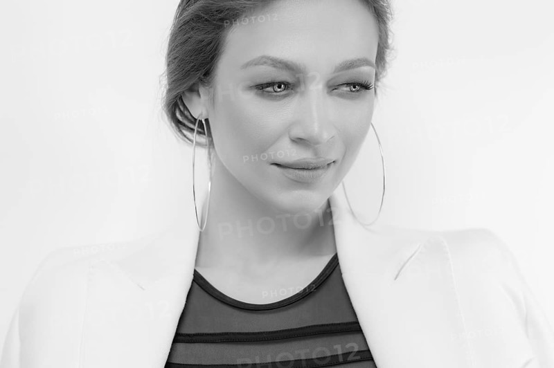 Portrait of a beautiful girl with a defiant make-up. White background. Beauty concept. High quality