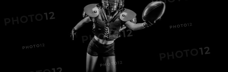 NO name portrait of a woman in shoulders pads. American football. Sports concept.
