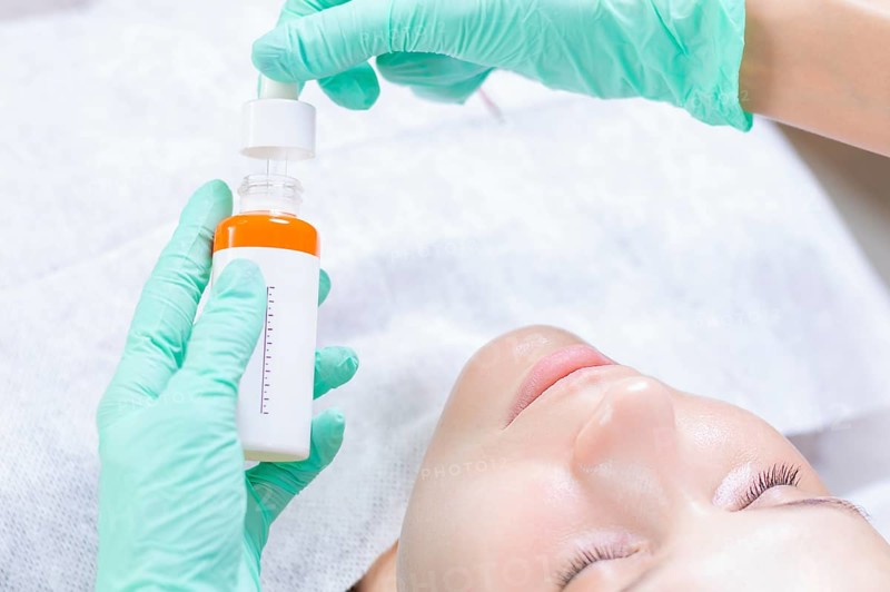 Image of bottles with medicines for facial skin care. Concept for beauty salons.