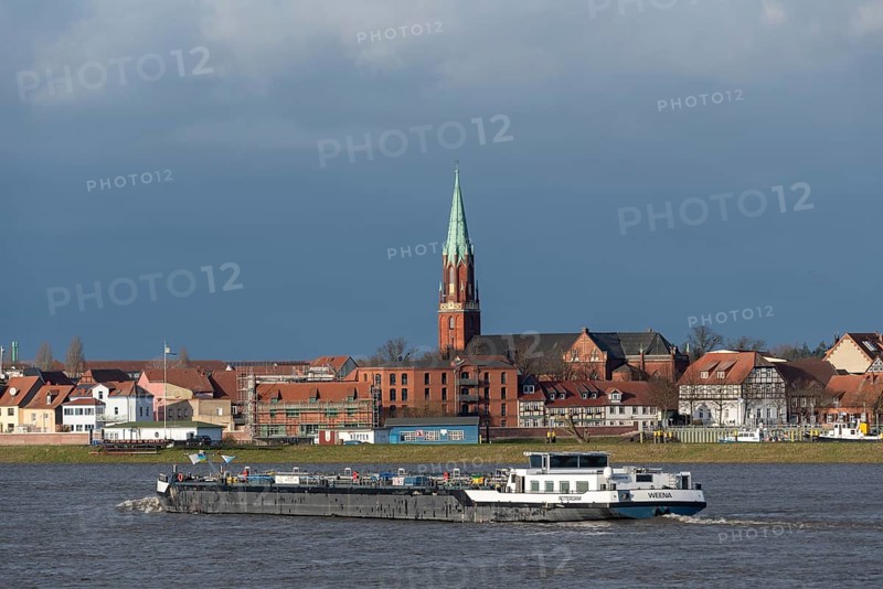 Barge on the Elbe with church in the background