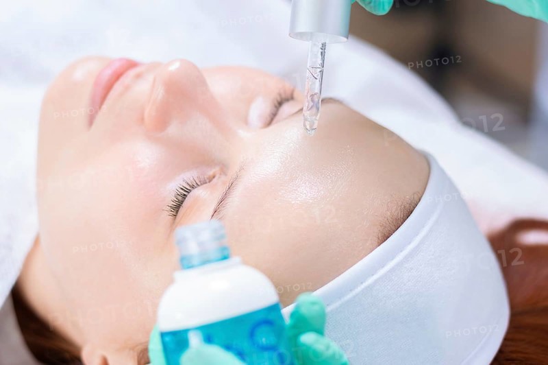 Image of bottles with medicines for facial skin care. Concept for beauty salons.