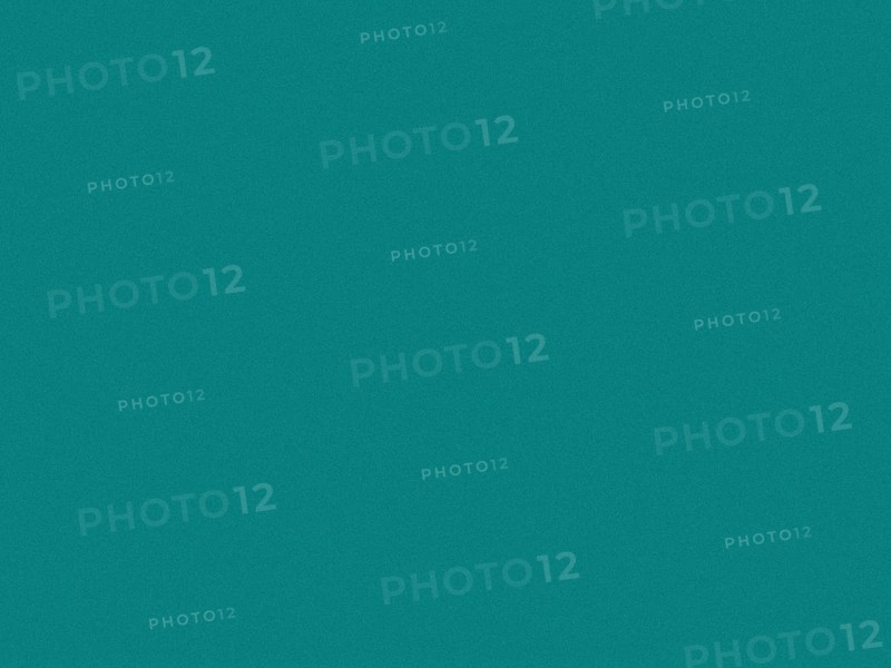 Teal background with speckles of noise