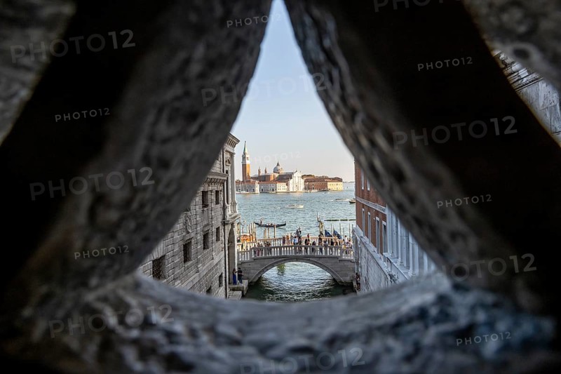 View from the Bridge of Sighs through a small hatch