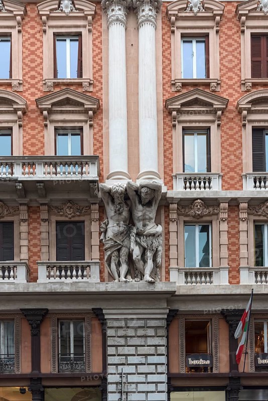 Atlases on a historic house facade