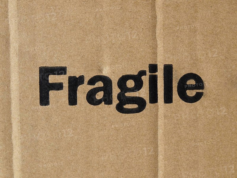 Corrugated cardboard with fragile label