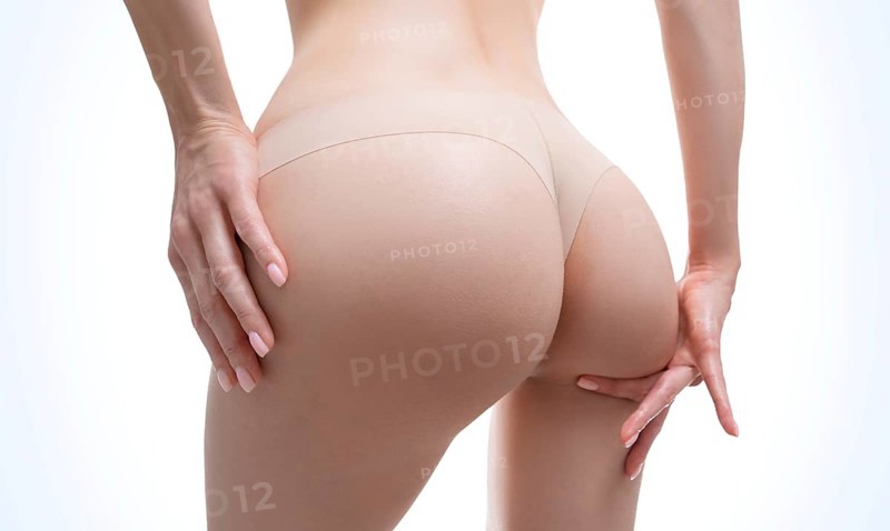 Image of female buttocks. Body care. Diet. Proper nutrition. Calorie counting. Healthy lifestyle. Anti-cellulite.