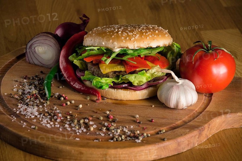 Delicious cheeseburger with fried beef chops