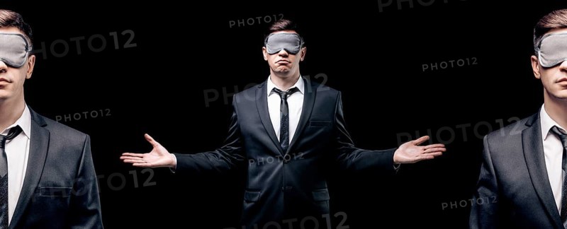 Combined portrait of a man in a mask for sleeping. He is standing on a black background. Concept of blind business