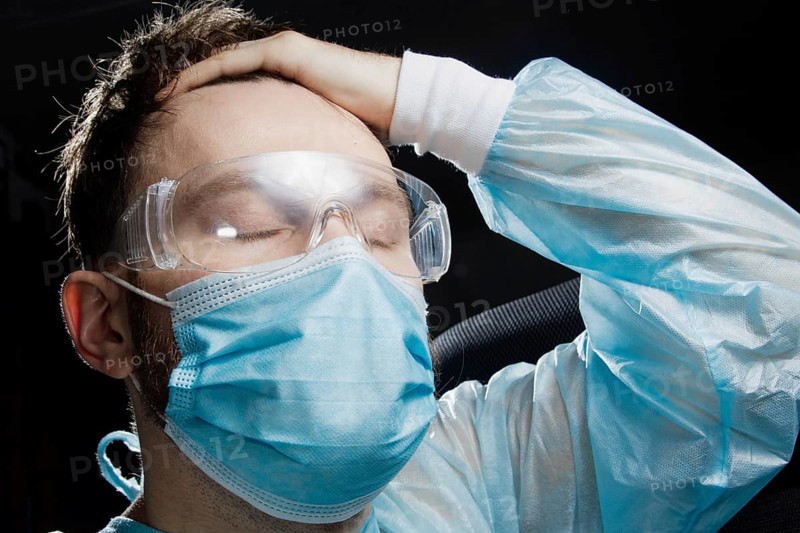 Surgeon is worried and worried in nervous tension