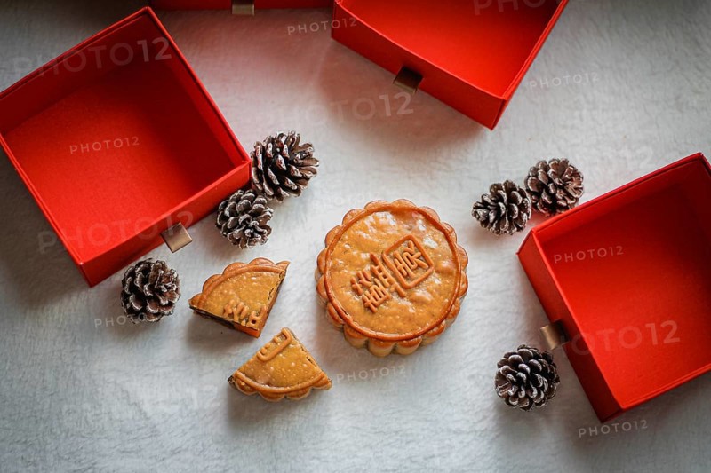 Chinese mooncakes and pinecones symbolizing the Mid-Autumn Festival