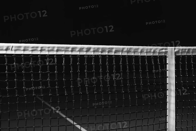 Image of a tennis court with a stretched net. Sports concept.