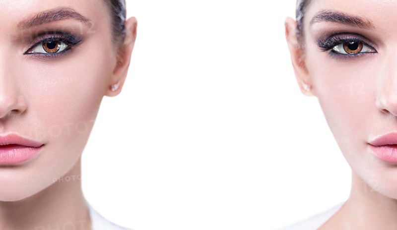 Portrait of a female young face with perfect makeup. The concept of plastic surgery