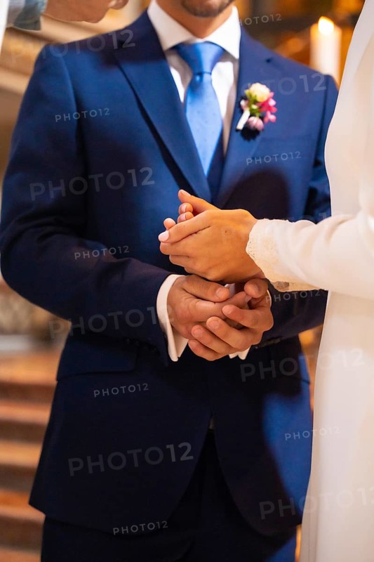 Bride and groom delivering earnest money at a church wedding