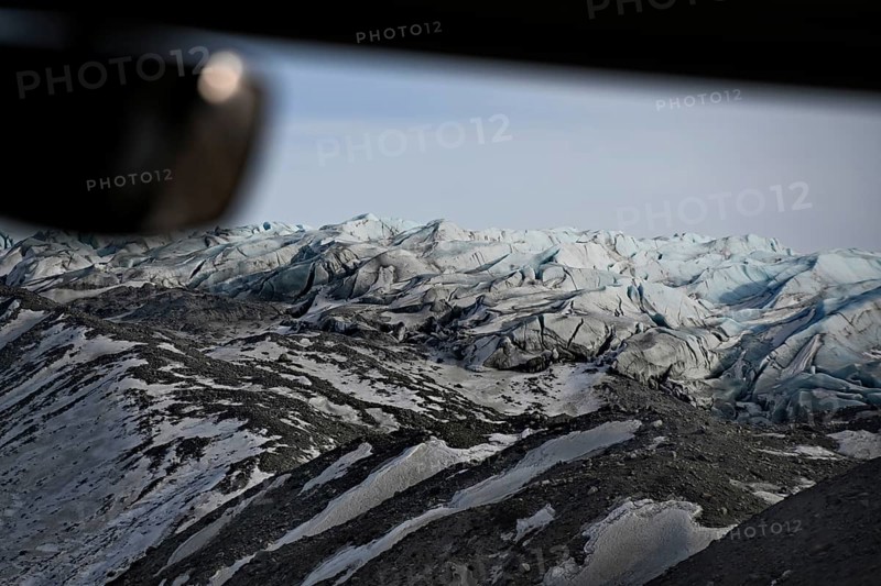 View through the windscreen of a bus onto the edge of the ice sheet north-east of Kangerlussuaq