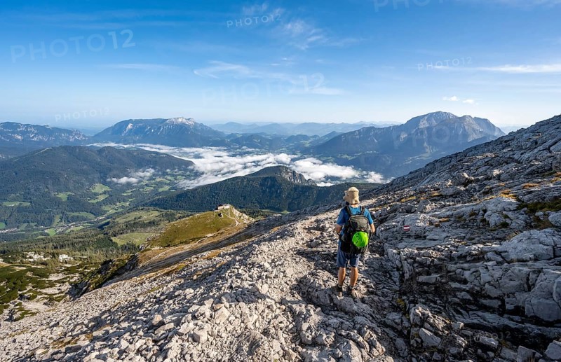 Mountaineer on hiking trail to Watzmann Hocheck summit