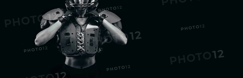 NO name portrait of a woman in shoulders pads. American football. Sports concept.