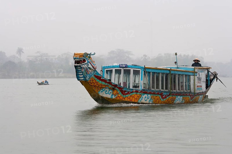 Boat on river in the fog