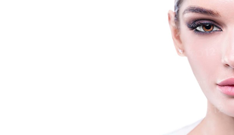 Portrait of a female young face with perfect makeup. The concept of plastic surgery