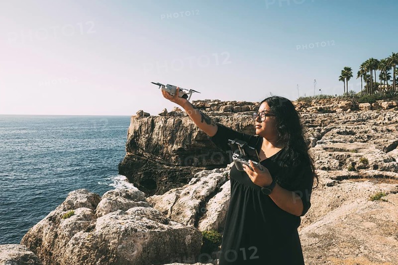 Happy woman with drone