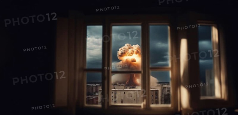 Nuclear explosion in the city view from the window