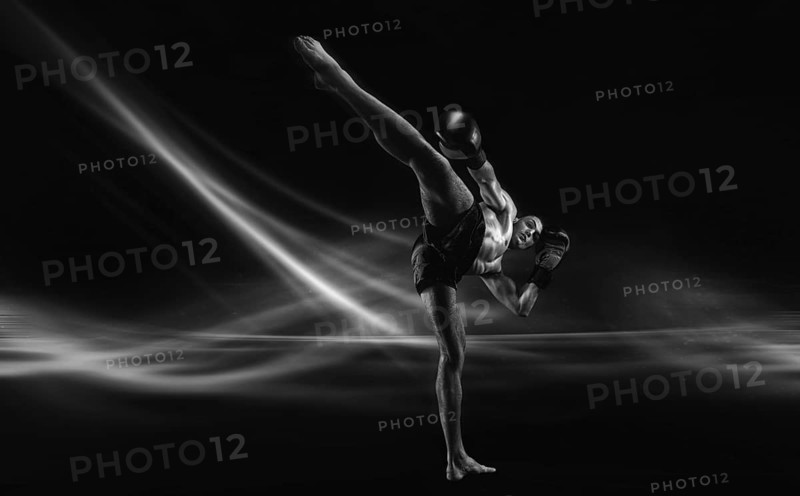 Black and white image of a mma fighter. Kickboxing concept. High quality