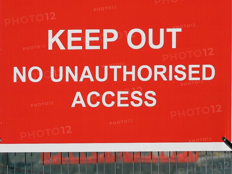 Keep Out No Unauthorised Access warning sign in a construction site