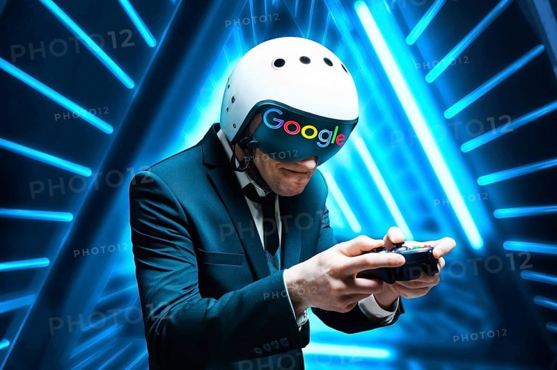 Portrait of a man in a suit and helmet of a pilot with a joystick in his hands. Game concept.