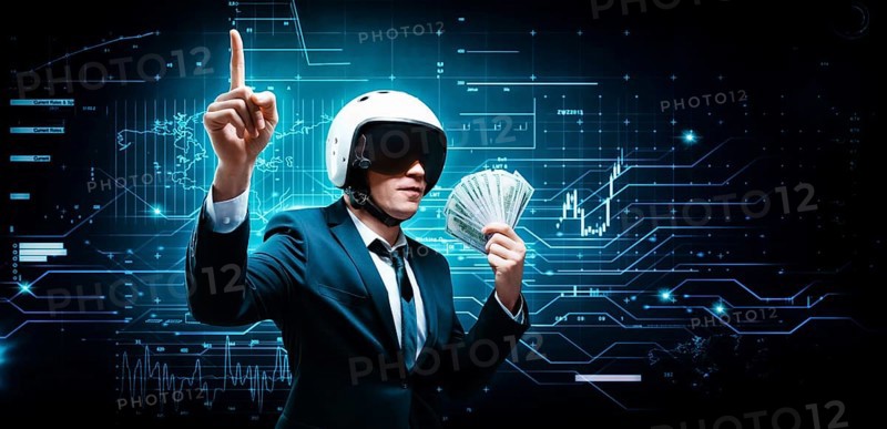 Portrait of a businessman in a suit and aviator helmet. He made a fan of a pack of hundred-dollar bills. Business concept.