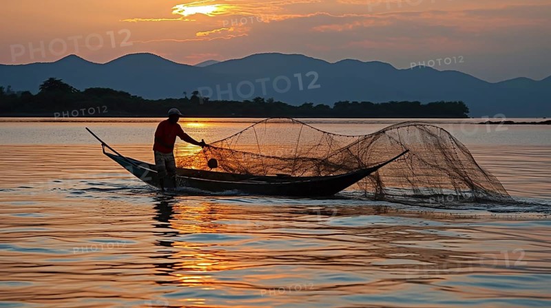 Fisherman stands on his boat