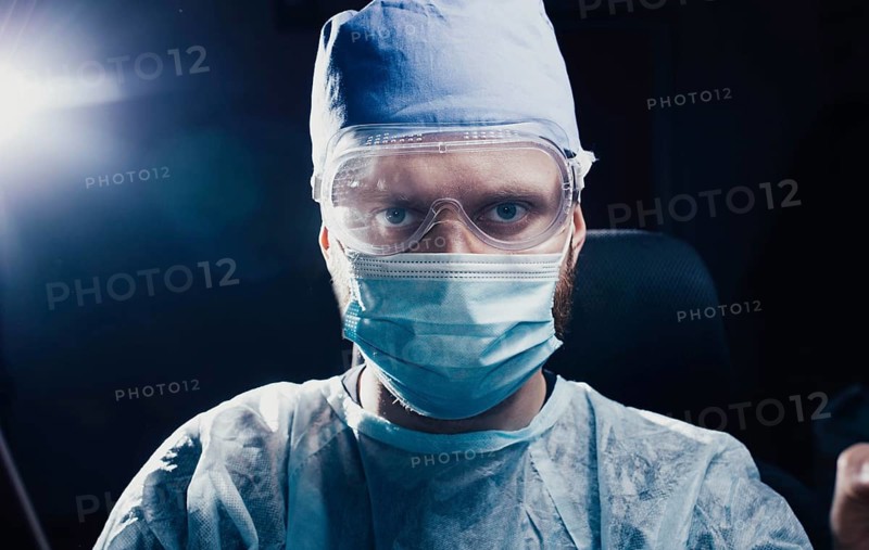 Medical laboratory assistant in personal protective equipment