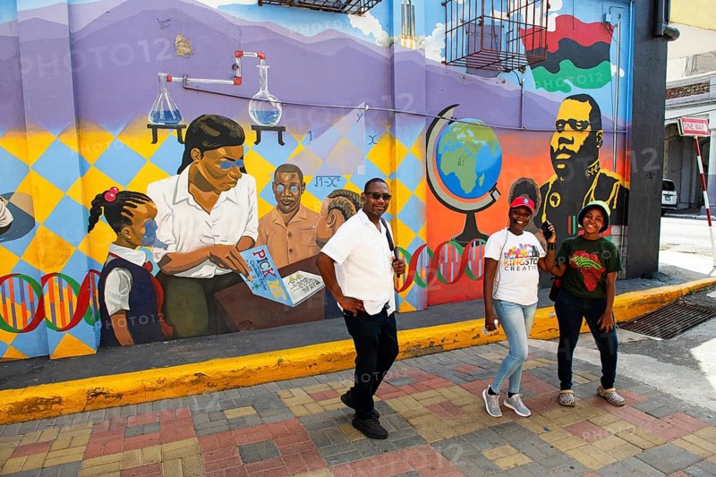 Guides in front of Marcus Garvey