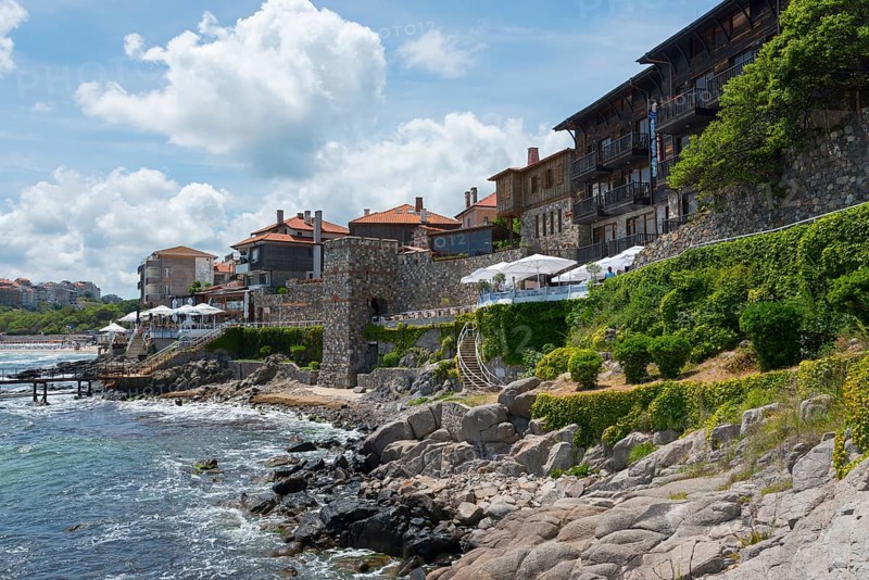 View of a picturesque coastal town with traditional architecture