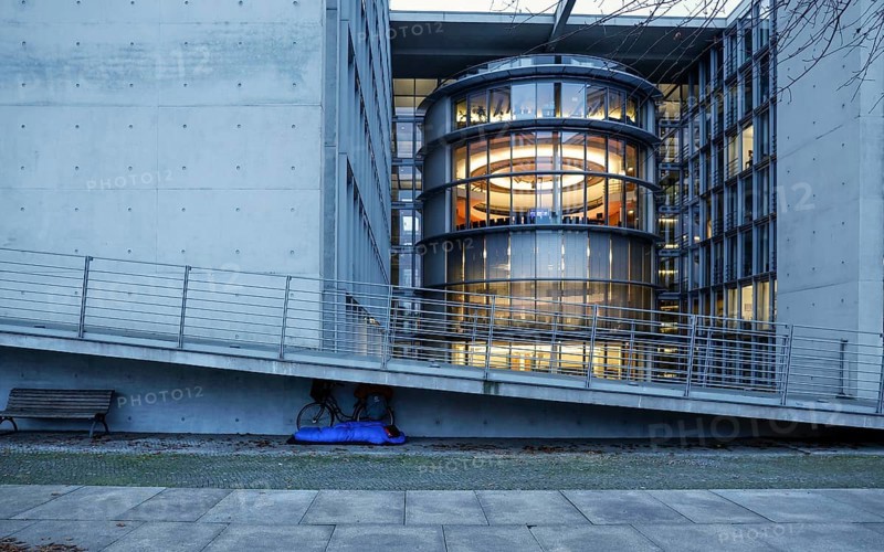 A homeless man sleeps in a sleeping bag at the Paul Loebe Haus. Aid organisations register an increase in homeless people