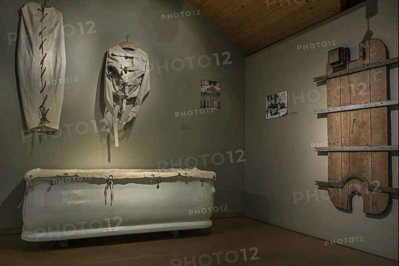Bathtub and straitjacket