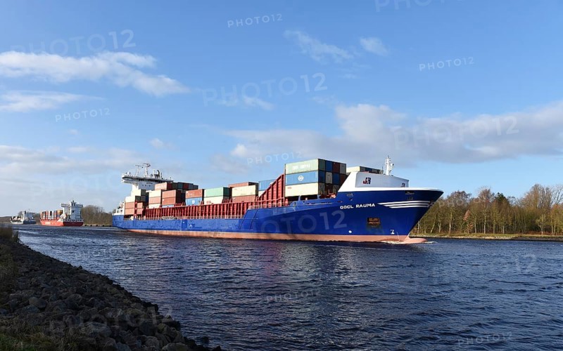 Container ship Oocl Rauma sailing in the Kiel Canal