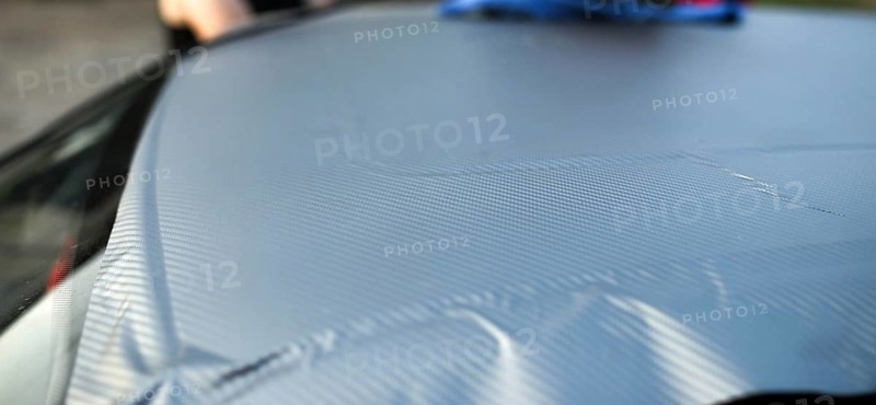 Covering the car body with carbon film