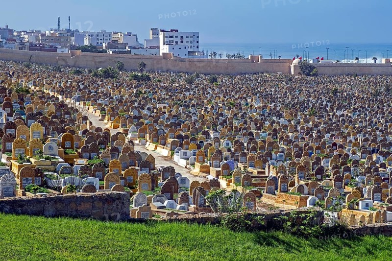 Islamic graves with headstones at the Laalou muslim cemetery with view on the Atlantic Ocean in the city Rabat