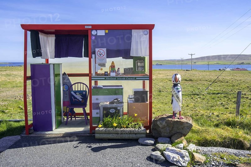 Amusing bus stop shelter furnished and decorated with home comforts near Baltasound