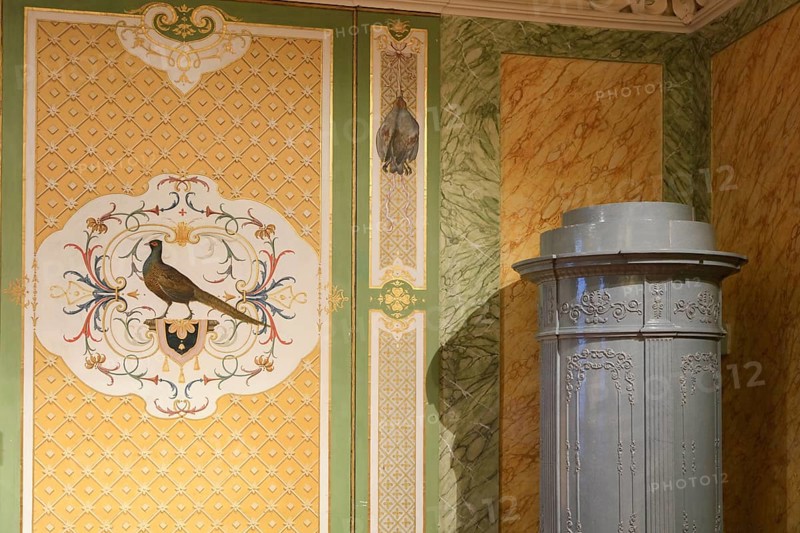 Painted wall panelling with pheasant