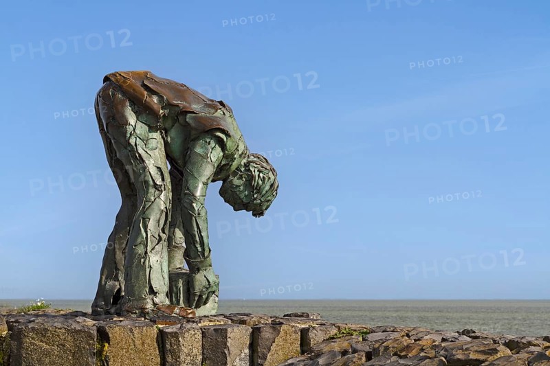 Monument to the stone setter on the Afsluitdijk between the Wadden Sea and the Ijsselmeer