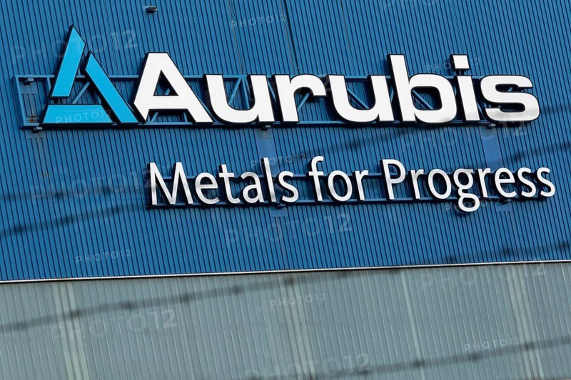 Logo and lettering Aurubis Metal for Progress on a factory building at the Aurubis AG plant