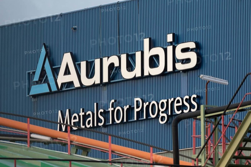 Logo and lettering Aurubis Metal for Progress on a factory building at the Aurubis AG plant