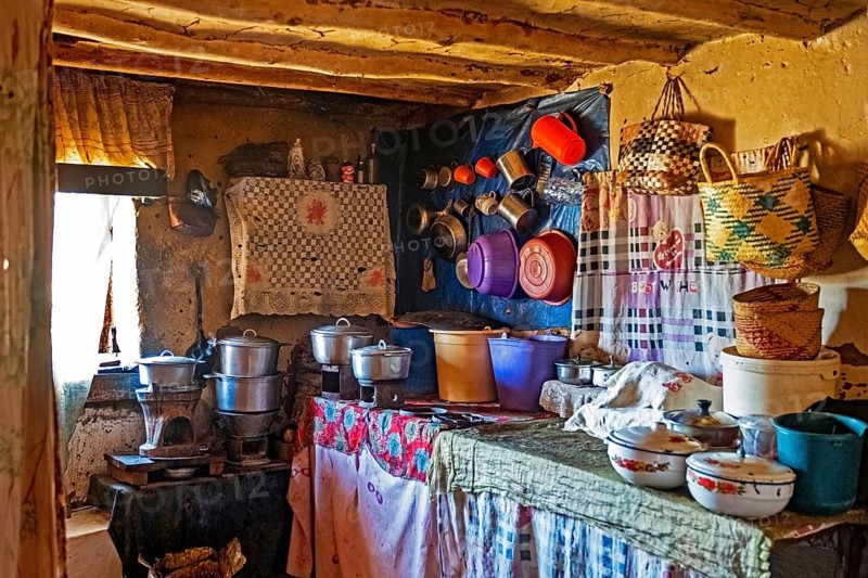 Interior of Betsileo house showing kitchen with pots and cooking utensils in the Haute Matsiatra Region
