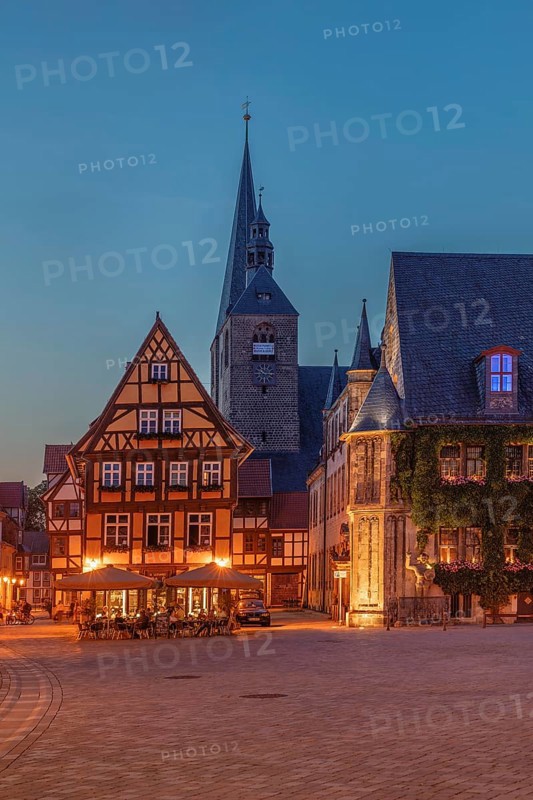 Cafe on the market square with St Benedikti church and town hall