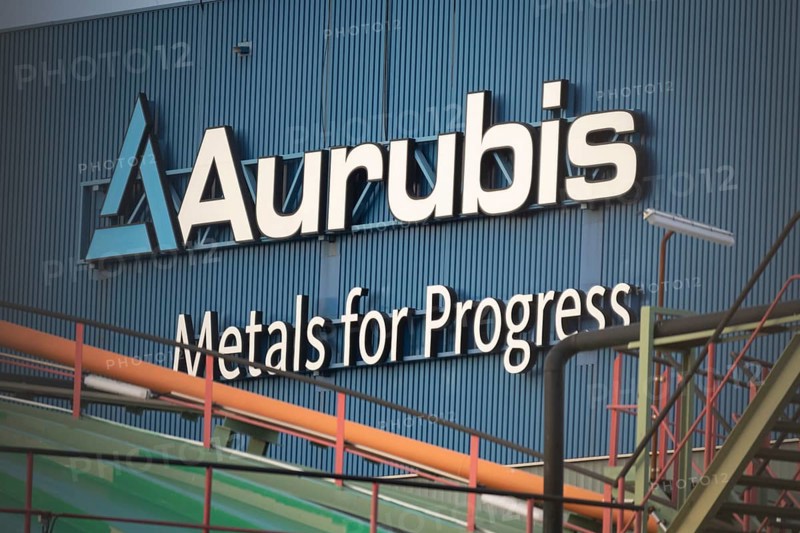 Logo and lettering Aurubis Metal for Progress on a factory building at the Aurubis AG plant