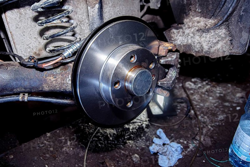 Installing a new brake disc on a car hub