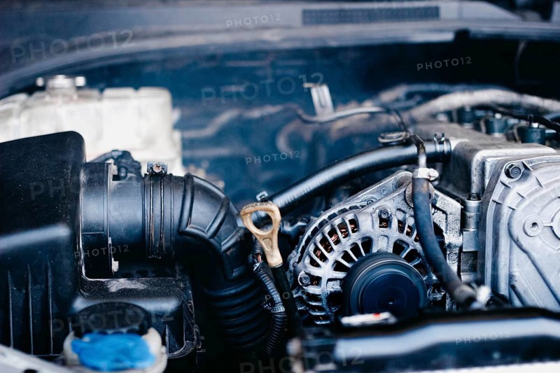 Generator in a car near an internal combustion engine