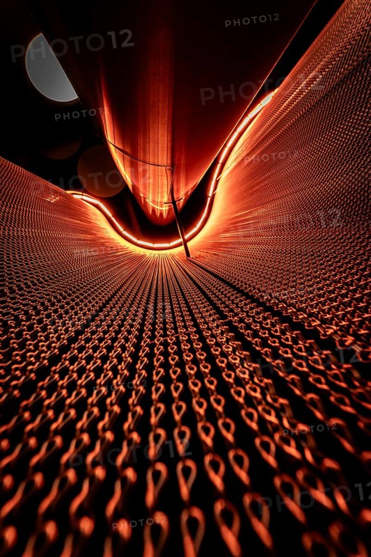 Futuristic red light installation with geometric patterns