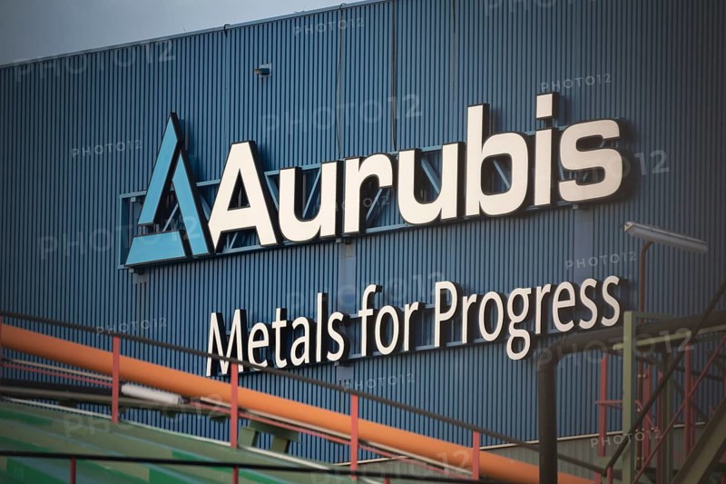 Logo and lettering Aurubis Metal for Progress on a factory building at the Aurubis AG plant