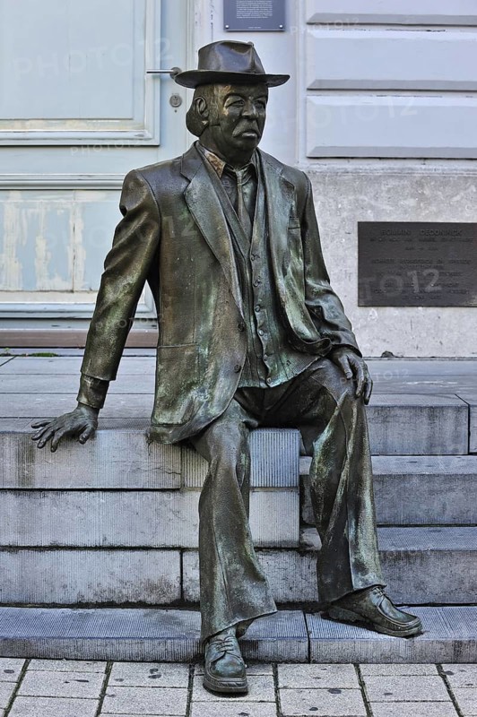 Statue of actor comedian Romain De Coninck in front of the Minard Theatre at Ghent